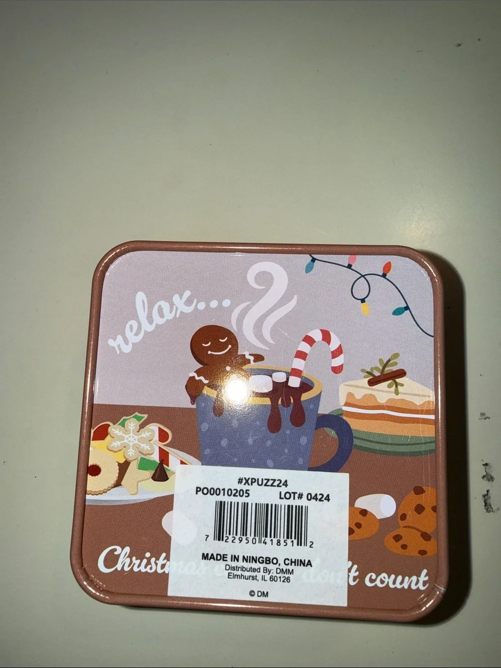 Relax Christmas Cookie Tin - Festive Brown Holiday Treats contains puzzles
